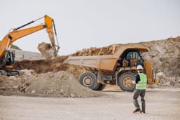 male-worker-with-bulldozer-sand-quarry.jpg